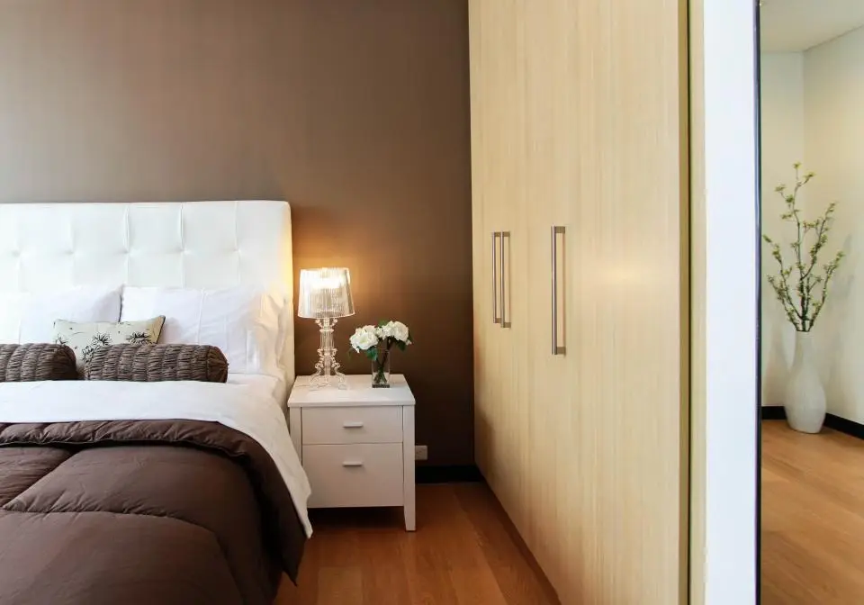 Bedroom with a wardrobe (representative photo)